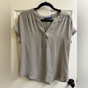 Grey flowy chiffon blouse.
